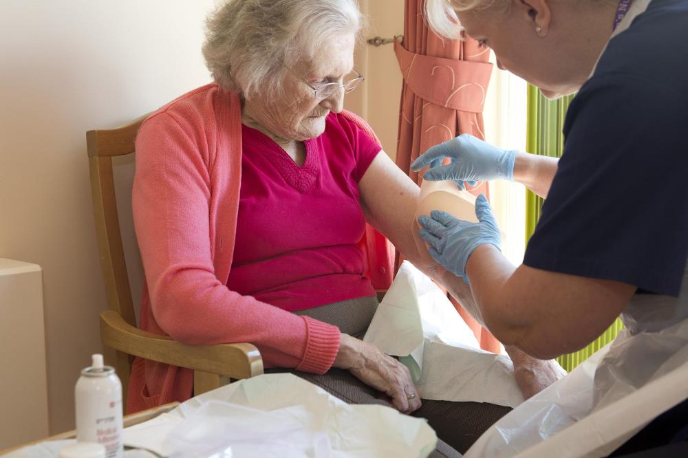 Queens nurse with patient 