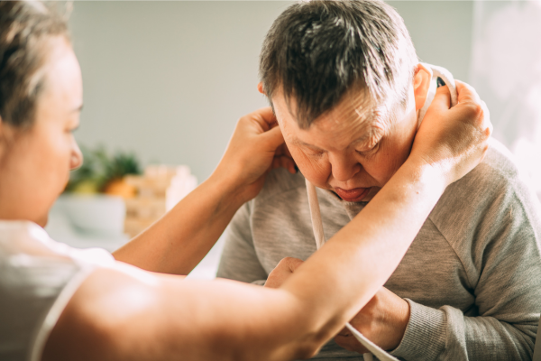 Man with downs syndrome and woman