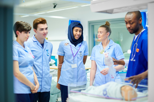 Nurses gathered on maternity ward