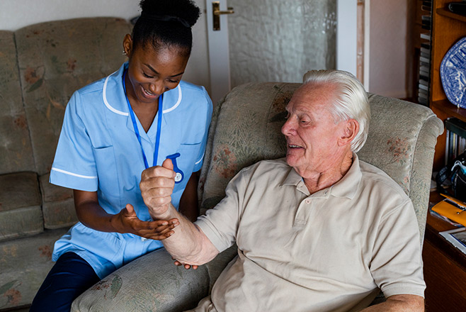 Nurse looking after an older gentleman