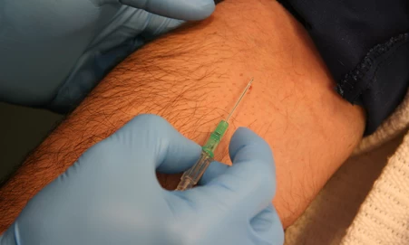 Nurse undertaking venepuncture