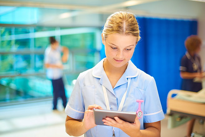 Nurse using a tablet