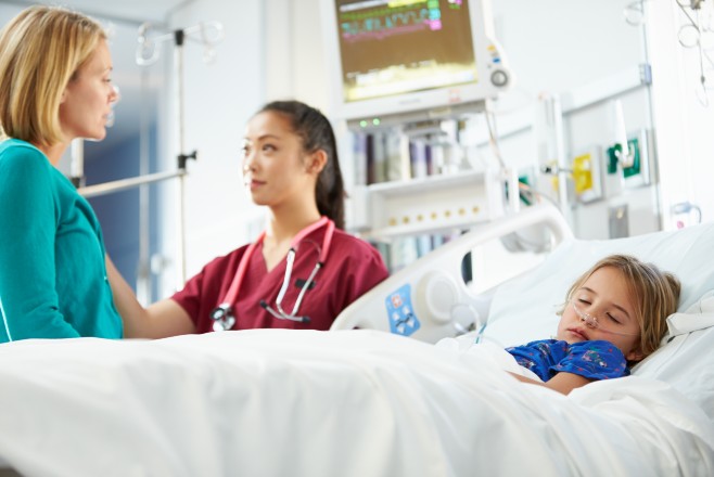 Sleeping child in ICU bed Sleeping child in ICU bed