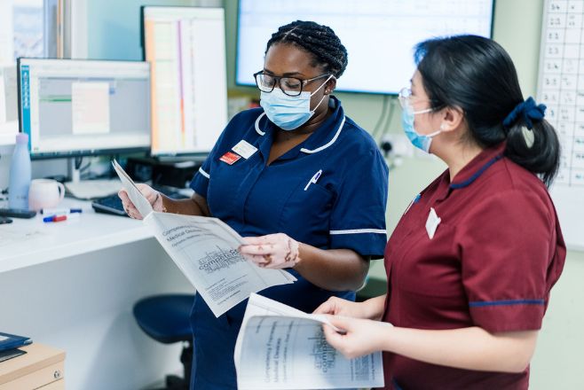 Nurses talking to one another