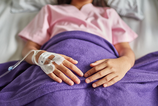 Patient in bed on IV