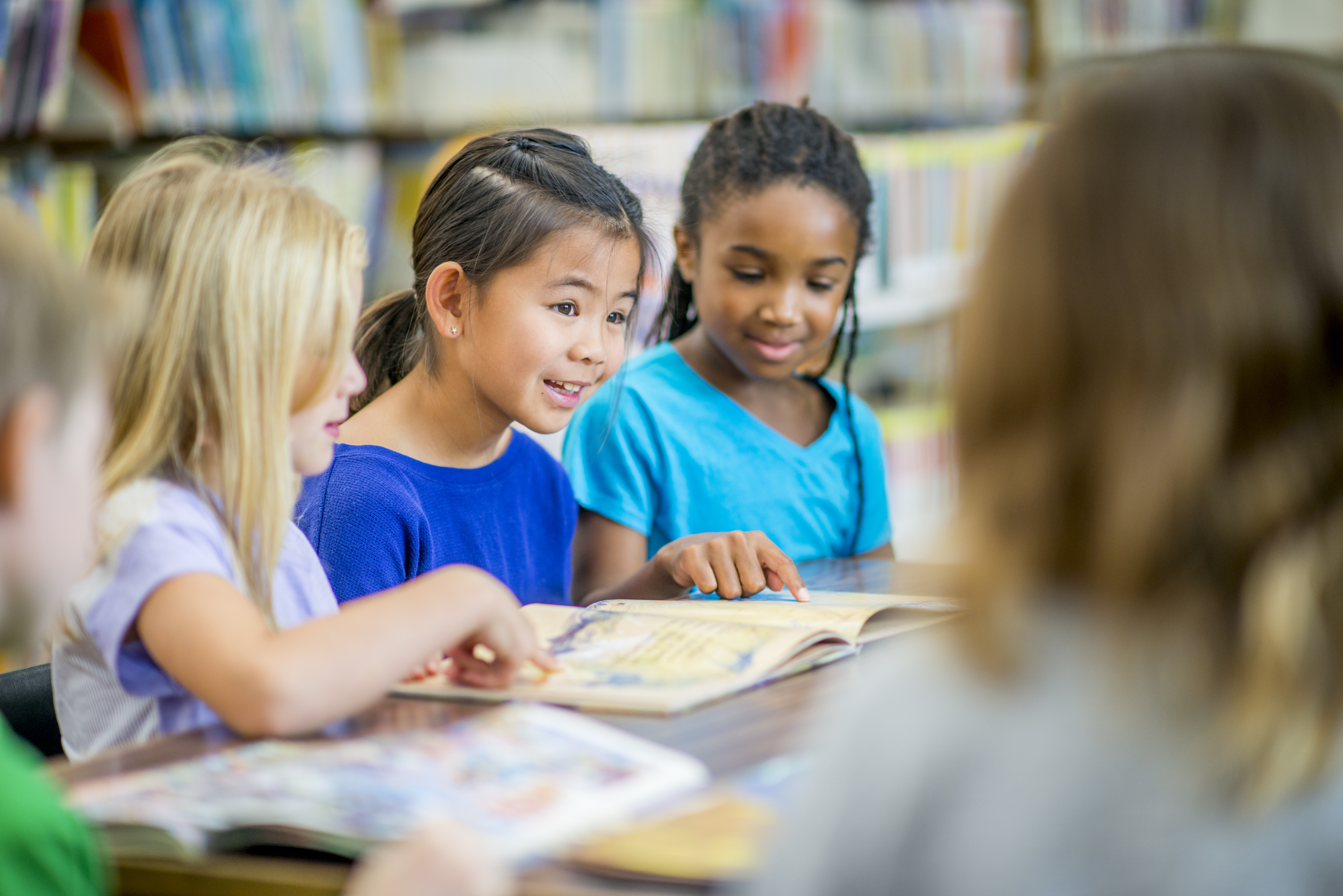 Children reading a book