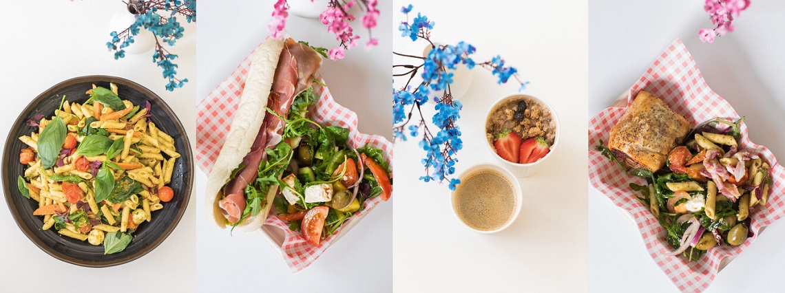 A collage of four different meals: A bowl of pasta, a ham sandwich with salad, a cup of coffee with a bowl of granola, and a sausage roll with salad
