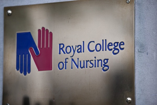A plaque with the RCN logo