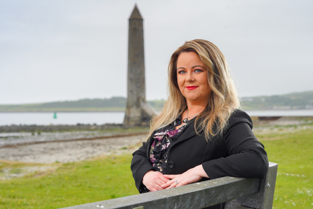 Trade Union Committee Chair Denise Kelly sitting on a bench