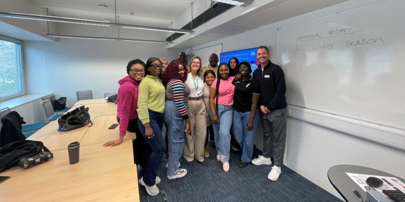 Callum pictured with students from the University of East Anglia (UEA).