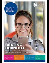 Cover of Bulletin November issue with student member Hollie holding out her phone