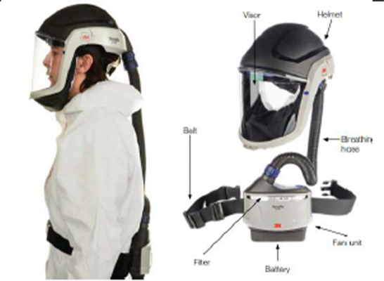 A photograph of a person wearing a powered respirator with hood