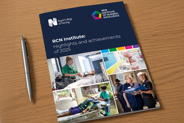 A report with the title 'RCN Institute: Highlights and achievements of 2025' on a desk