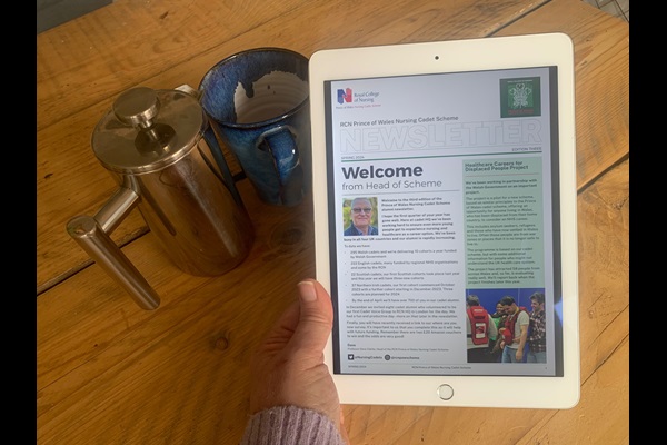 Photo of RCN POW Nursing Cadet Scheme Spring 2024 newsletter being viewed on a tablet. 