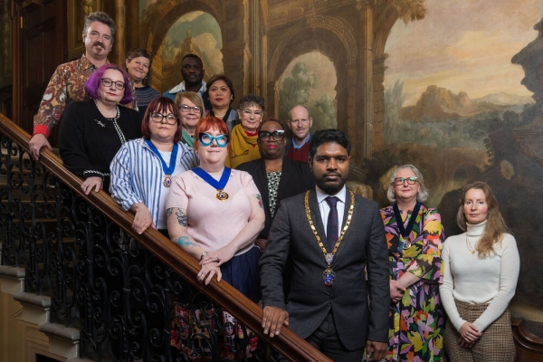 RCN Council members standing on the historic staircase at RCN HQ in London