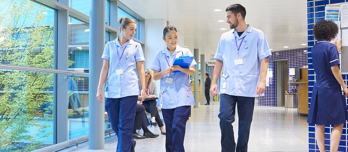 nursing staff walking in corridor