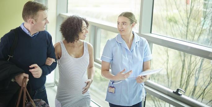 Midwife with patient