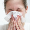 Lady sneezing
