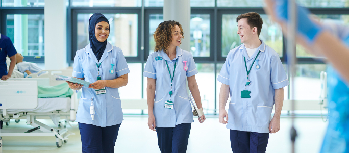 Nurses smiling on the ward