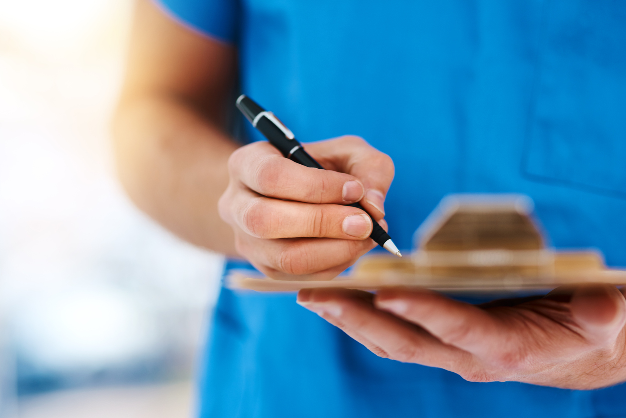 male nurse with pen