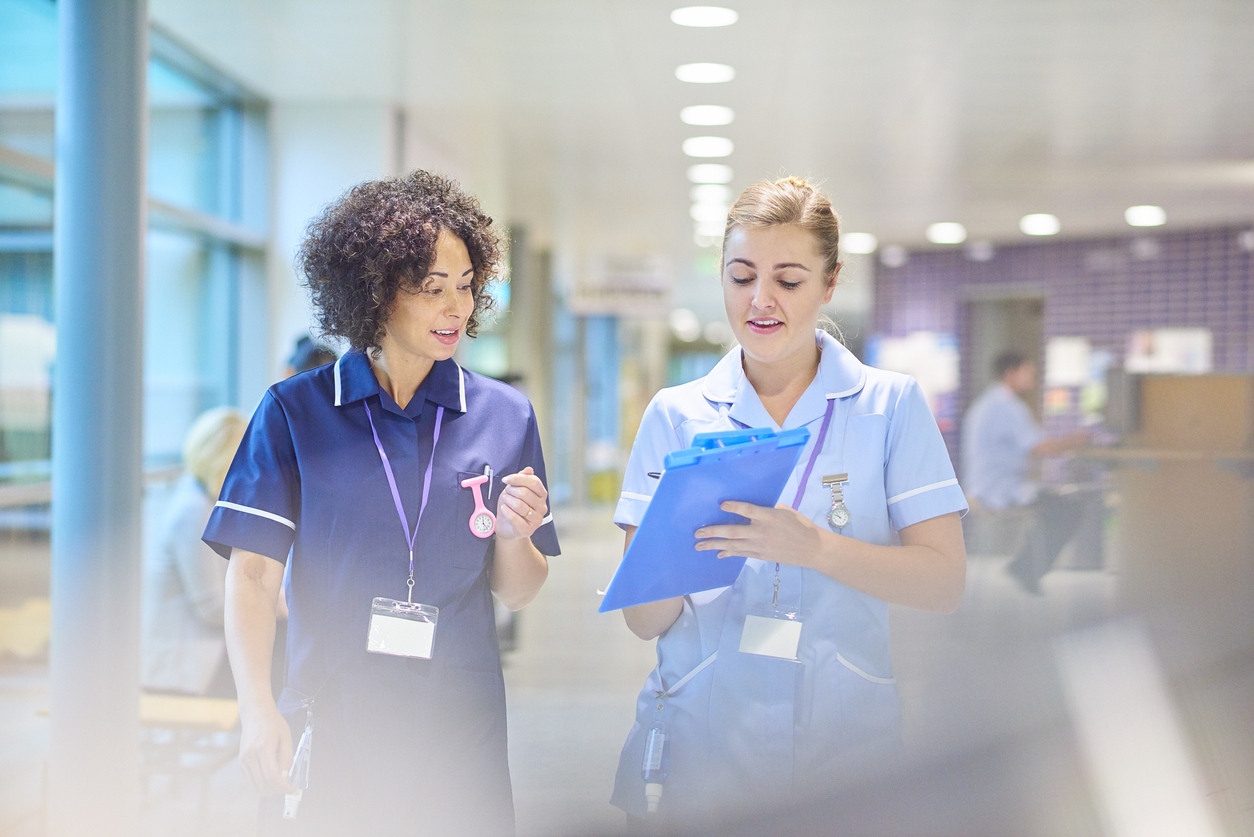 nurses-with-paperwork-in-hospital