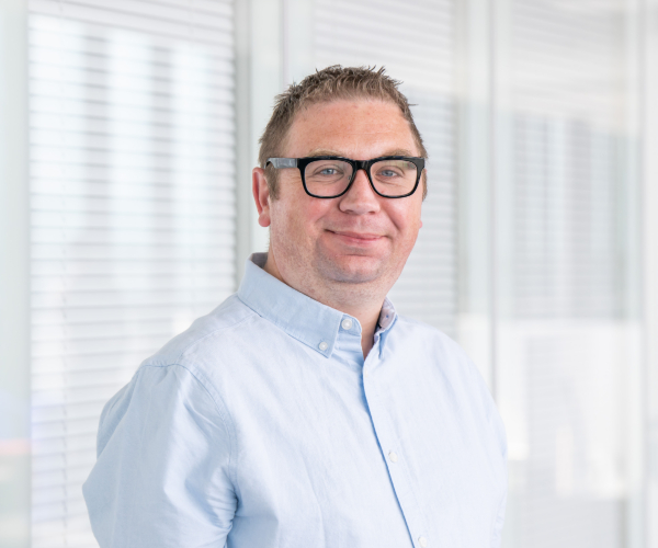 An image of Mark Jarnell, Nursing Support Worker member of RCN Council, standing in front of a white background