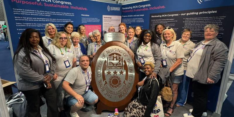 Northumberland Tyne and Wear Branch at Congress '25 in Liverpool Northumberland Tyne and Wear Branch at Congress '25 in Liverpool - a group of people in grey branch polo shirts grouped around a giant RCN badge