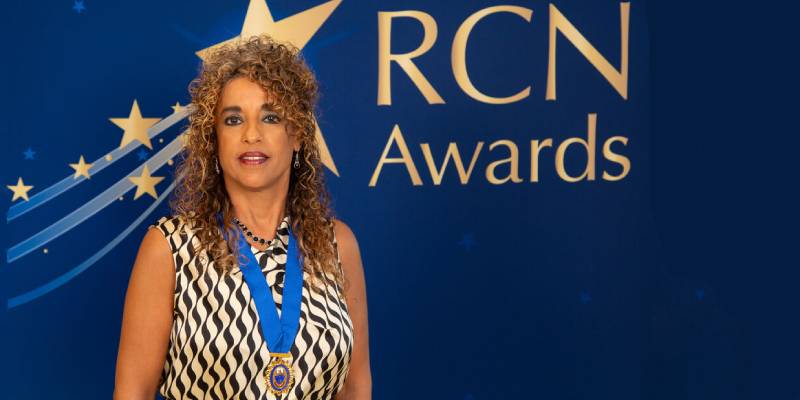 Roaqah Shaher with her Award of Merit at the RCN Congress Awards ceremony 2024 Roaqah-Shaher-Award-of-Merit-2024-800x400