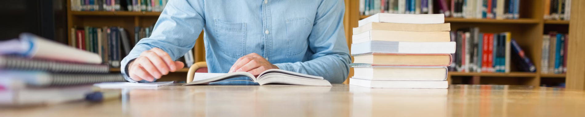 Nurse studying in a library