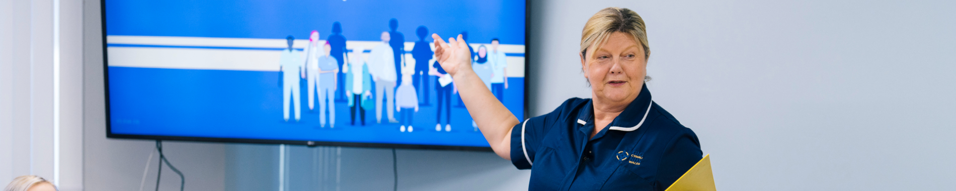 Senior nurse teaching a class of nurses