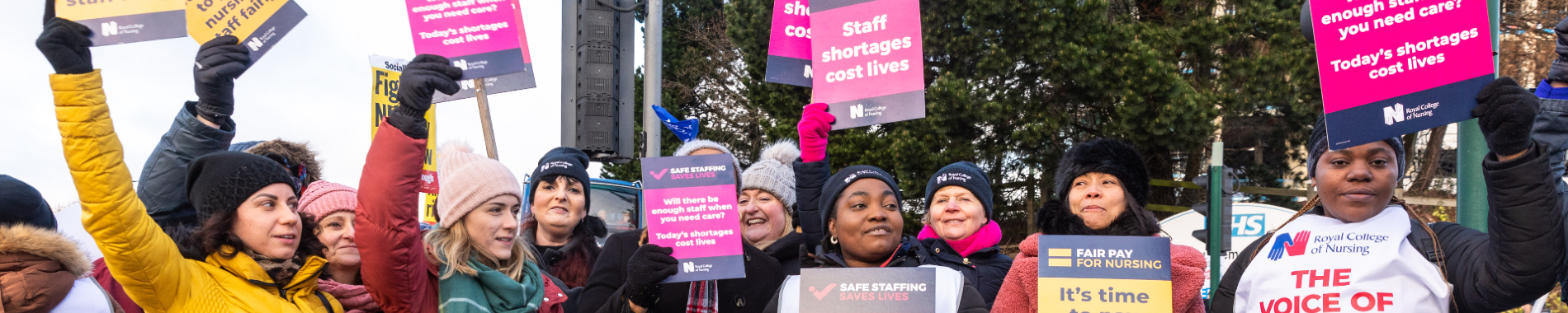 Image of nurses at a picket line