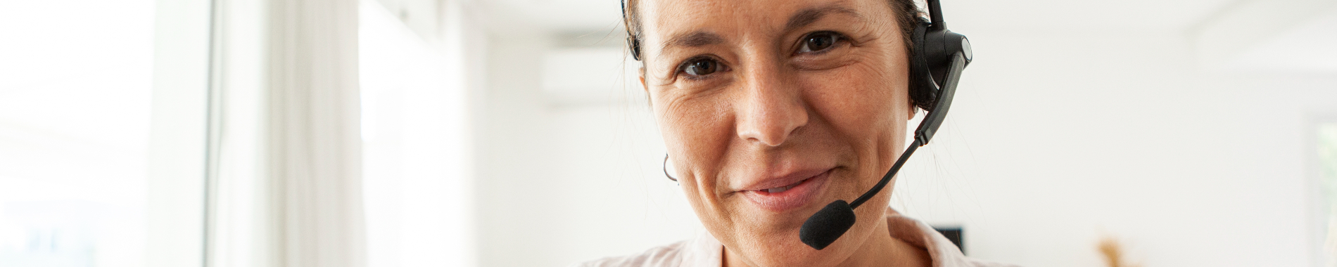 Smiling woman with headset