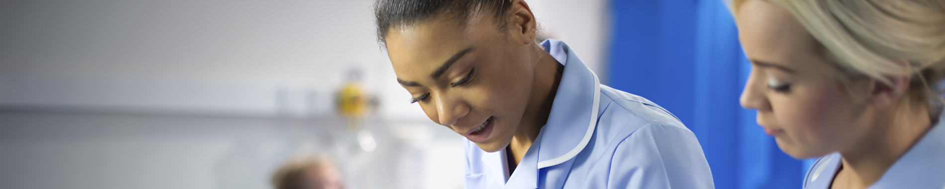 Two nurses in discussion