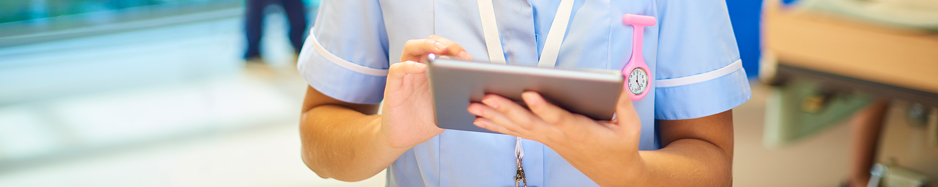 nurse using tablet