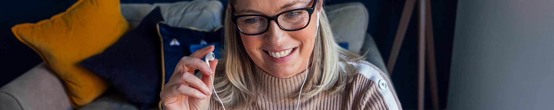 smiling woman wearing headphones