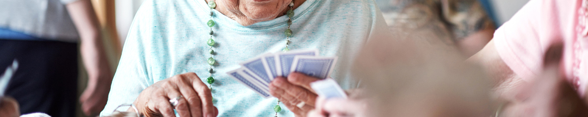 elderly women playing cards 