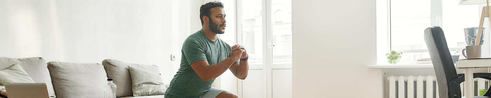 man working out at home