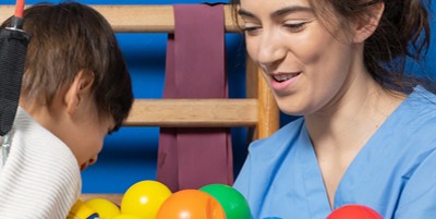 Nurse smiling with child