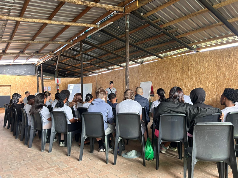 People attending a diabetes lecture in Africa