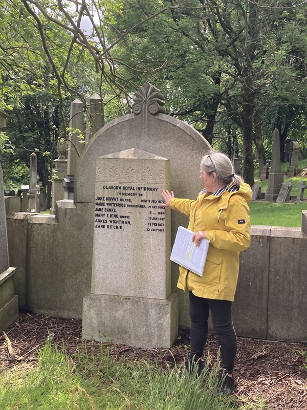 RCN Forum member standing by a grave stone