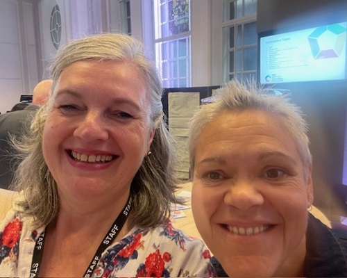 Liz Walsh Professional Lead and a colleague at a conference