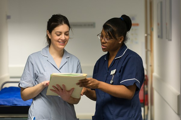 Image of health and safety reps talking