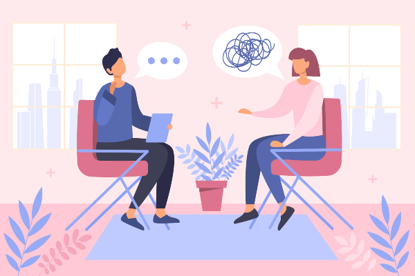 Man and woman talking in therapy session