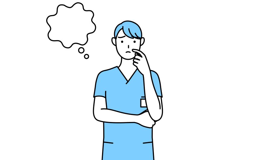 A health care worker in a thoughtful stance