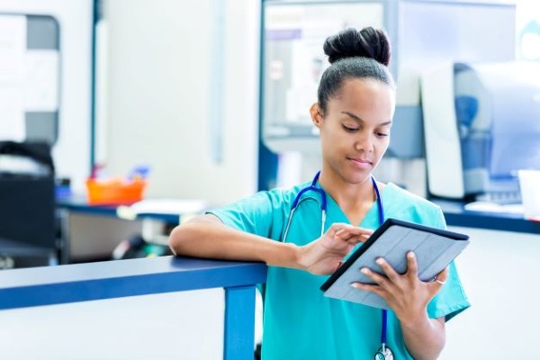 Nurse looking at tablet