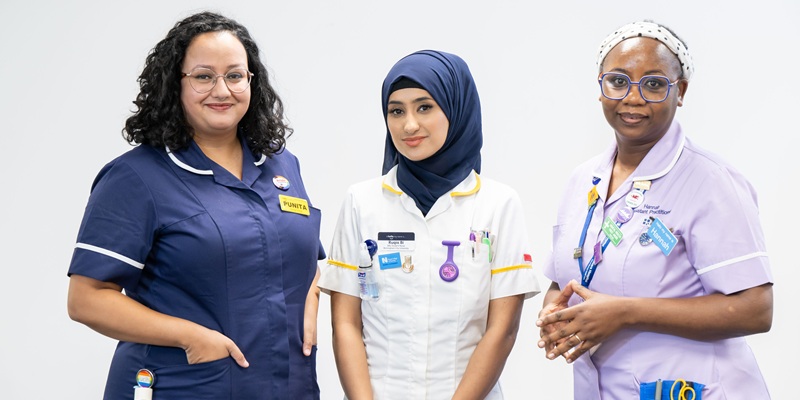 Three nurses looking at camera