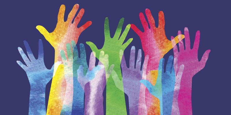 multicoloured image of hands raised in the air