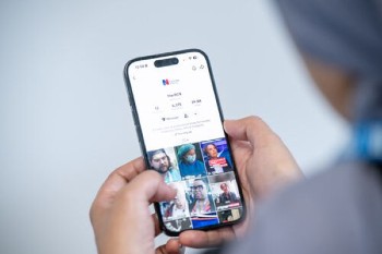 A person looking at social media on their smartphone.