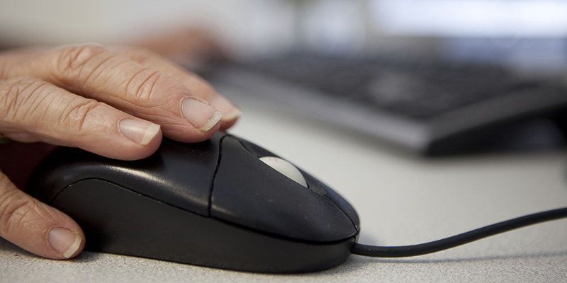 Close up of a hand on a computer mouse