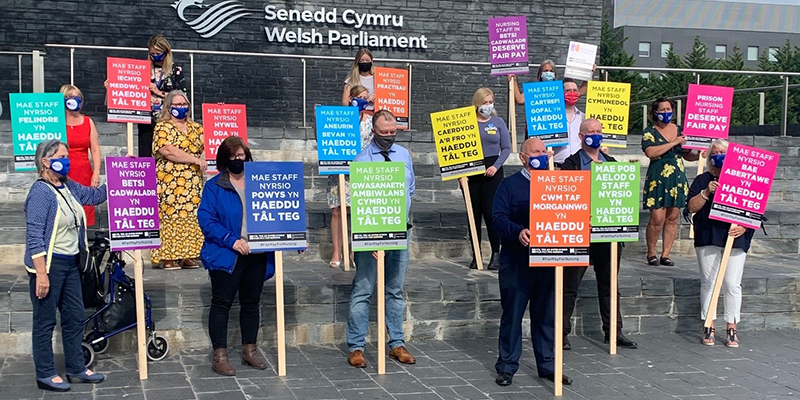 Wales Senedd Fair Pay for Nursing Wales members campaign for Fair Pay for Nursing outside the Senedd Cymru